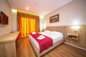 CLASS Hotel 객실 침대