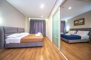 CLASS Hotel 객실 침대