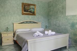 Llit o llits en una habitació de L'Arlesiana