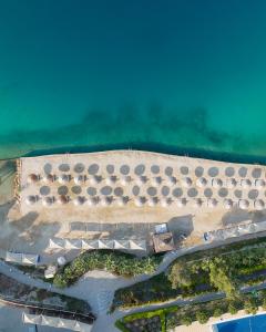 an aerial view of a building in the water at La Blanche Island Bodrum in Guvercinlik