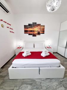 Säng eller sängar i ett rum på Albatros B&B Porto Cesareo