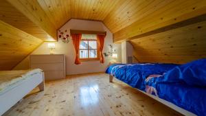 Posteľ alebo postele v izbe v ubytovaní Holiday House Pečišće