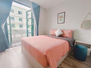 Postel nebo postele na pokoji v ubytování Minh Anh Hotel
