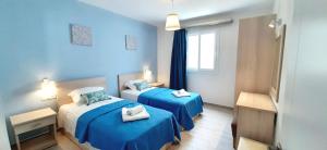 Posteľ alebo postele v izbe v ubytovaní The Central Residence - Kassiopi Corfu Villas