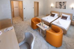 Voodi või voodid majutusasutuse Euro Garni Hotel toas