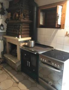 Η κουζίνα ή μικρή κουζίνα στο Baita Palue