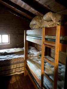 Poschodová posteľ alebo postele v izbe v ubytovaní Baita Palue