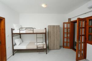 Postel nebo postele na pokoji v ubytování GK Houses #2 + 27 fotografií