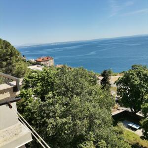 a view of the ocean from a building at APARTMAN FLAVIA in Rijeka