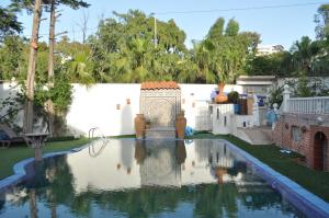 Πισίνα στο ή κοντά στο Malabata Guest House