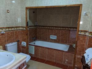 Ένα μπάνιο στο Malabata Guest House