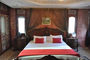 Ένα ή περισσότερα κρεβάτια σε δωμάτιο στο Malabata Guest House