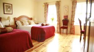 Voodi või voodid majutusasutuse Glendine Country House Wexford toas