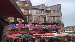 a group of umbrellas in front of a building at La Casa di Orlando in Catania