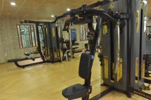 a gym with a bunch of tread machines in it at Rain Forest Resort Phu Quoc in Phu Quoc