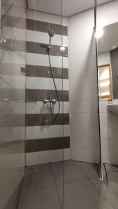 Koupelna v ubytování Agogo Downtown Hotel Surabaya