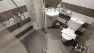 Koupelna v ubytování Agogo Downtown Hotel Surabaya