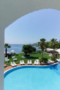 a view of a swimming pool at a resort at Costa Luvi Hotel Bodrum - All Inclusive in Gümbet