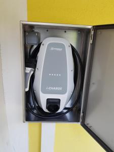 a white appliance sitting in a metal box at Ferienwohnung am Blasturm in Schwandorf in Bayern