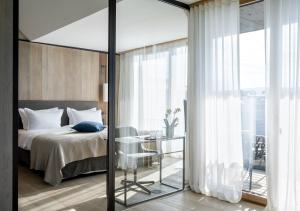 Postel nebo postele na pokoji v ubytování Hotel Hirschen Horn
