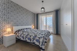 Postel nebo postele na pokoji v ubytování Santiago Astalavista sea view 4