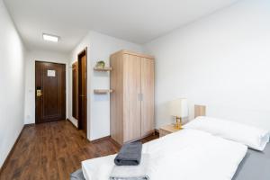 Postel nebo postele na pokoji v ubytování Pension Lesná