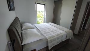 Postel nebo postele na pokoji v ubytování Villa Indigo