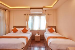 Letto o letti in una camera di The Samrat Palace - Luxury Hotel in Kathmandu