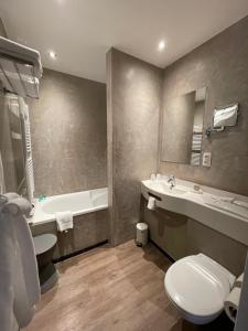 Koupelna v ubytování Hotel Montanus