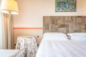 Voodi või voodid majutusasutuse Relais di Campagna I Tamasotti toas
