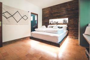 Łóżko lub łóżka w pokoju w obiekcie Rifugio Pian di Rocchi