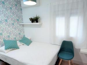 Posteľ alebo postele v izbe v ubytovaní Malagueta Beach & Muelle1 & Centre con Parking Privado + 8 fotografií