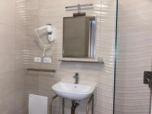Koupelna v ubytování Fllad Resort & SPA Durres