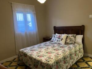 A bed or beds in a room at CAL GUINEU