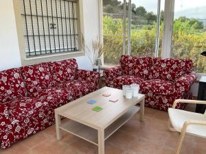 A seating area at LA ANTIGUA CASA DEL ASTRONOMO Casa Rural