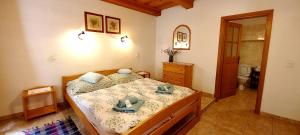Cama o camas de una habitación en Penzion Merlin