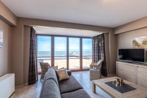 TV a/nebo společenská místnost v ubytování Appartement Blankenberge Zeedijk aan de Pier
