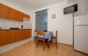 Kuchyň nebo kuchyňský kout v ubytování Apartments Kordić