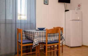 Kuchyň nebo kuchyňský kout v ubytování Apartments Kordić