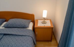 Postel nebo postele na pokoji v ubytování Apartments Kordić