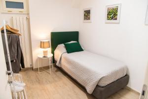 Postel nebo postele na pokoji v ubytování ON' MICHELE GUEST HOUSE
