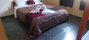 Cama o camas de una habitación en Recanto Varandas Guararema