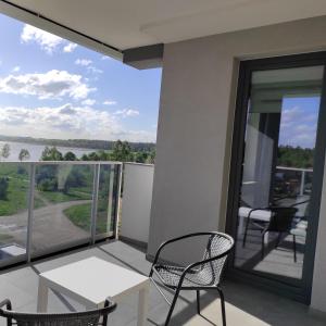 Fotografia z galérie ubytovania Apartament J Towers z widokiem na jezioro v destinácii Ełk