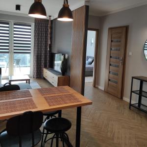 Fotografia z galérie ubytovania Apartament J Towers z widokiem na jezioro v destinácii Ełk
