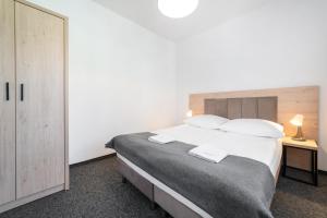 Postel nebo postele na pokoji v ubytování Dom Wczasowy Danusia