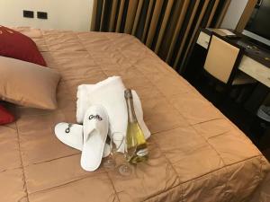 Letto o letti in una camera di Gullo Hotel