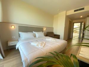 Postel nebo postele na pokoji v ubytování Fllad Resort & SPA Durres