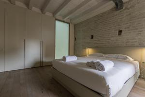 Postel nebo postele na pokoji v ubytování Suite Corallo - Smart Holiday