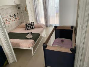 Postel nebo postele na pokoji v ubytování BADAROSA 2 House10min to BARCELONCity&NearTo BEACH