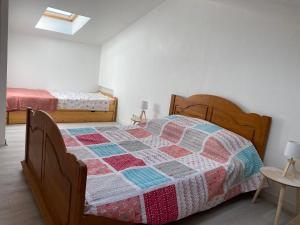 Posteľ alebo postele v izbe v ubytovaní Location de vacances